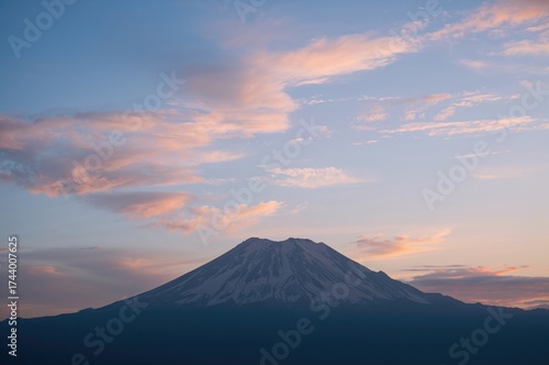 Outline of a peak against a...