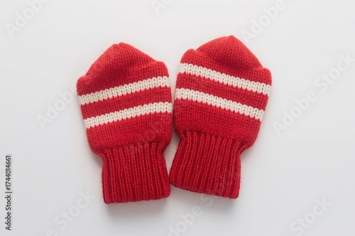 Red striped gloves set on a...