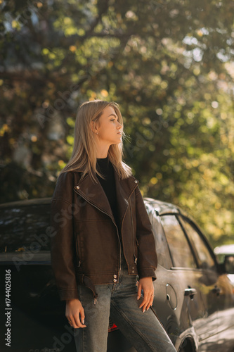A girl in a leather jacket 7098.