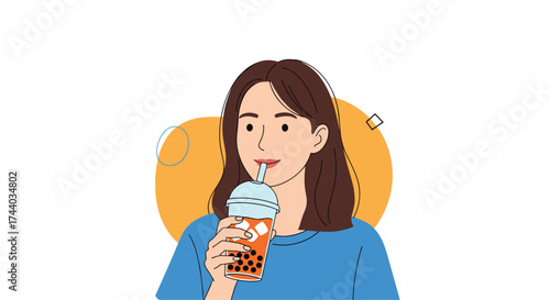 A young woman enjoying a refreshing cup of bubble tea.