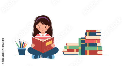 A young girl is happily reading a book surrounded by stacks of literature.