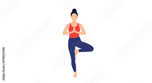 A woman practicing yoga tree pose for balance and focus.