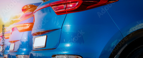 Blue business car with shiny front lights color bright