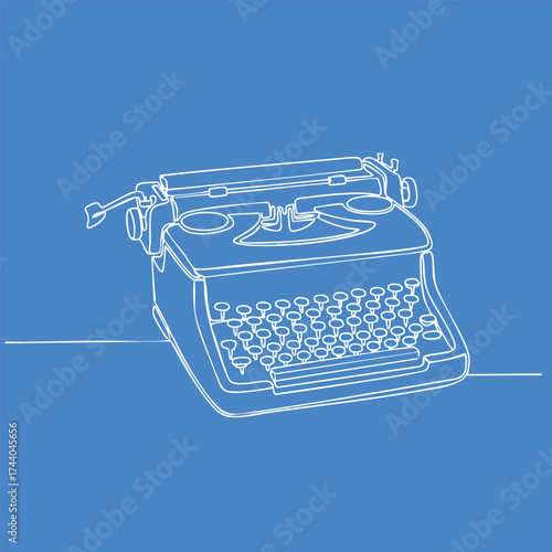 Vintage typewriter with round keys and a carriage return lever on a solid