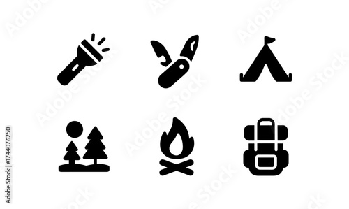 Essential camping gear icons in silhouette style for outdoor adventures