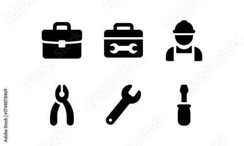 Essential tools and worker icons in simplistic black silhouette style