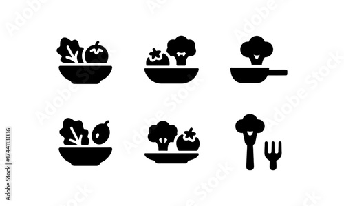 Minimalist kitchen icons featuring fruits and vegetables in bold silhouette design