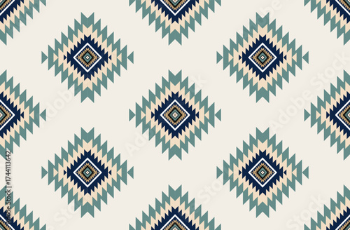 Seamless geometric ethnic pattern inspired by Native American tribal fabric. Traditional Aztec and Navajo style carpet and tile vector design on navy blue background. Perfect for textile, wrapping,