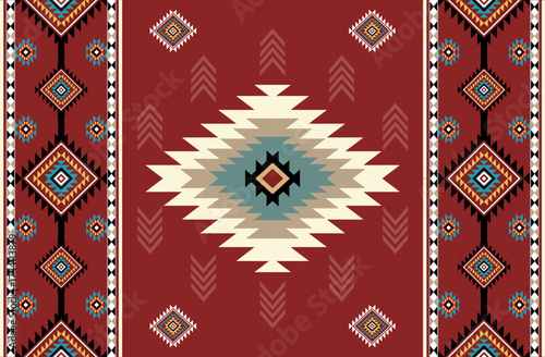 Seamless geometric ethnic pattern inspired by Native American tribal fabric. Traditional Aztec and Navajo style carpet and tile vector design on navy blue background. Perfect for textile, wrapping,
