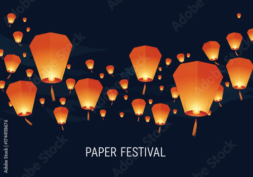 Many orange lanterns float in the night sky with the words Paper Festival written below them
