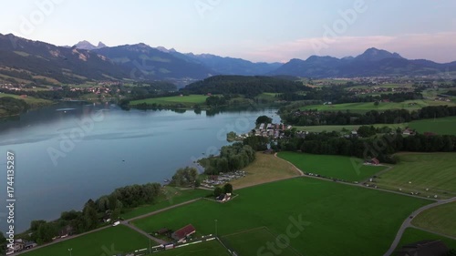 Cinematic aerial drone footage of scenic Swiss Alps. Snow-capped peaks, green valleys, and dramatic mountain landscapes captured in stunning 4K. Ideal for travel, nature, and landscape projects
