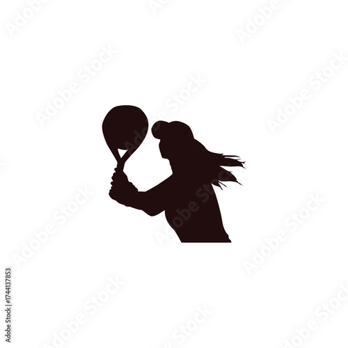 Silhouette of a woman playing tennis with a racket and ball in motion