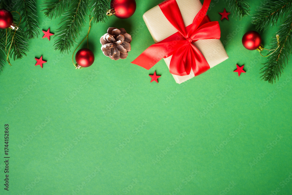 Naklejka premium Christmas flat lay background on green.