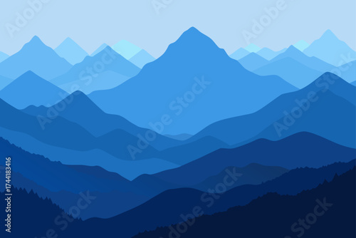 Layers of blue mountain ranges in a hazy distance