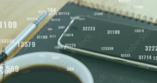 After delay cup rising, notebook, pen and phone shifting, numbers floating, showing data flow