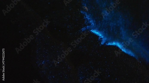 Closeup of bioluminescence (Noctiluca scintillans) in the waves