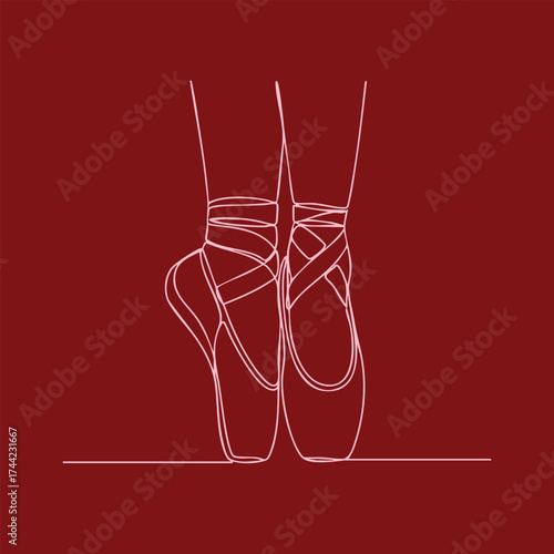 Elegant ballet dancer's feet en pointe with detailed toe shoes and ribbons against a deep red