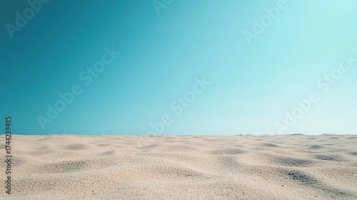 Fototapeta Naklejka Na Ścianę i Meble -  empty sandy beach, clear blue sky with lots of negative space
