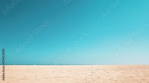 empty sandy beach, clear blue sky with lots of negative space, 