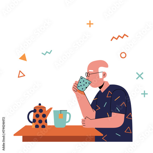 Elderly man sipping tea from cup while sitting at table with teapot  