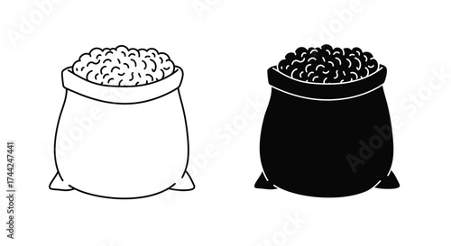 Two simple bags filled with granular material one light and one dark
