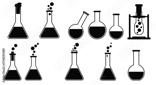 Collection of various chemical glassware and laboratory equipment in black and white