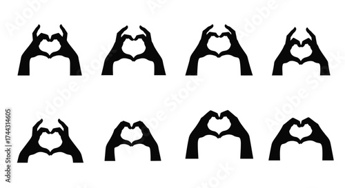 Black silhouettes of hands forming heart shapes in a repeating pattern