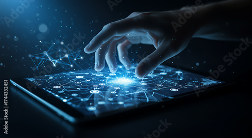 Hand touching glowing digital network on tablet screen 1