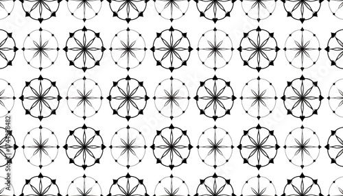Repeating pattern of black and white circular motifs.  Interlocking floral, star-like designs on a white background.  Symmetrical, geometric, intricate