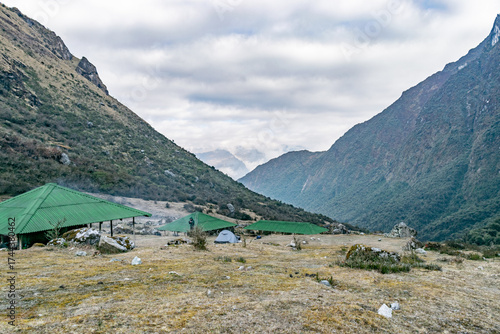 Salkantay trek campsite establishing in andes mountains peru