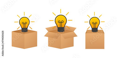 Lightbulb shining out of a cardboard box