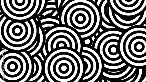 Overlapping Concentric Circles in a Chaotic Black and White Abstract Pattern.