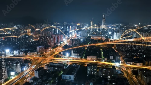 Wallpaper Mural Digital data streams and network connections over a futuristic smart city cityscape at night Torontodigital.ca