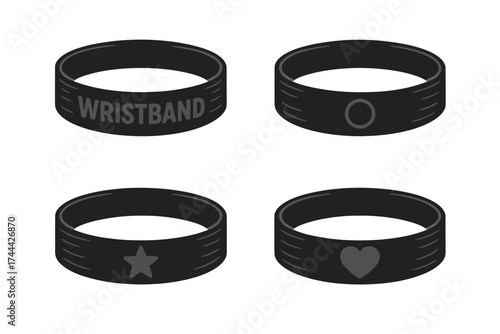 Set of four black silicone wristbands with various symbols