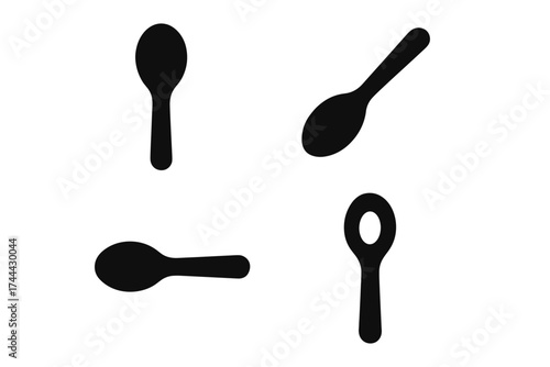 Set of simple black spoon silhouettes on white background