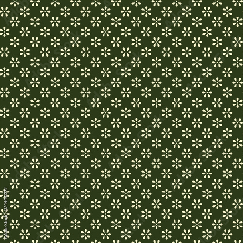 Delicate ivory floral pattern on deep green background ideal for textile