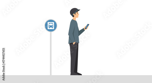 Young man patiently waits for bus, checking phone at modern transit stop