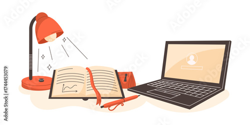 Workspace with laptop, lamp and open textbook representing study and learning process