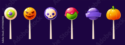 A selection of Halloween lollipops. Pumpkin shaped, skull shaped, and eye shaped. Various shapes and colors. Trick or treat.