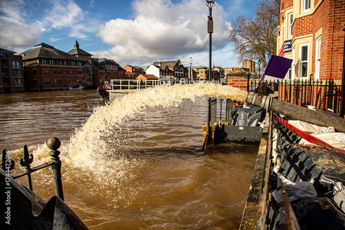 Water being pumped back into the River Ouse in York after buildings along the water front have been flooded out