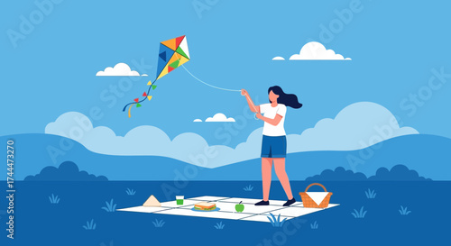 A woman enjoying a picnic and flying a kite representing leisure and recreation