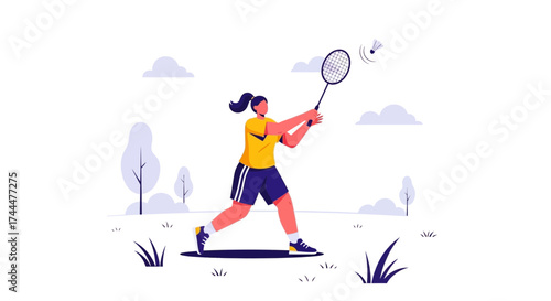 Active Woman Swinging Badminton Racket Against Green Field In Sunny Daylight