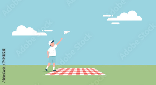 Boy Launching Paper Airplane During Picnic Under a Clear Blue Sky and Sunshine