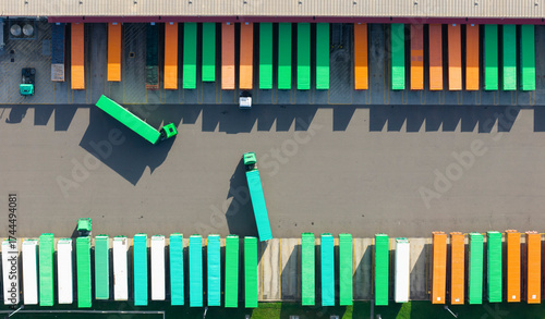 Aerial view of containers and trucks at depot