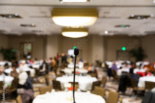 Microphone in front of a room at the beginning of an event