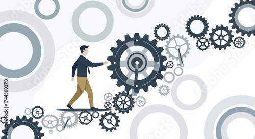 Businessman Engaged In The Process Of Leading And Synchronizing Gears Together