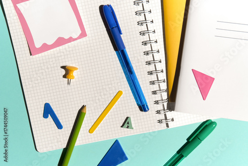 Colorful Flat Lay with Stationery Items. Blank Pages with Copy Space.