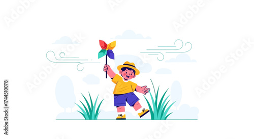 Cheerful Little Boy Enjoys Playing With Colorful Pinwheel On a Sunny Day