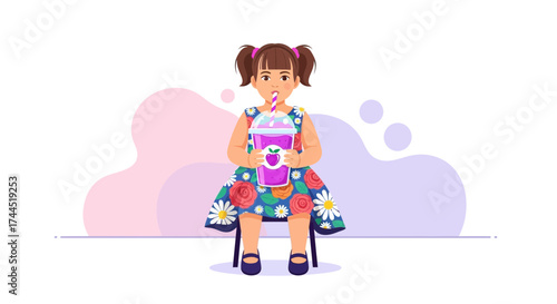 Child Sipping Refreshing Drink While Wearing Floral Dress Sitting Happily on a Chair