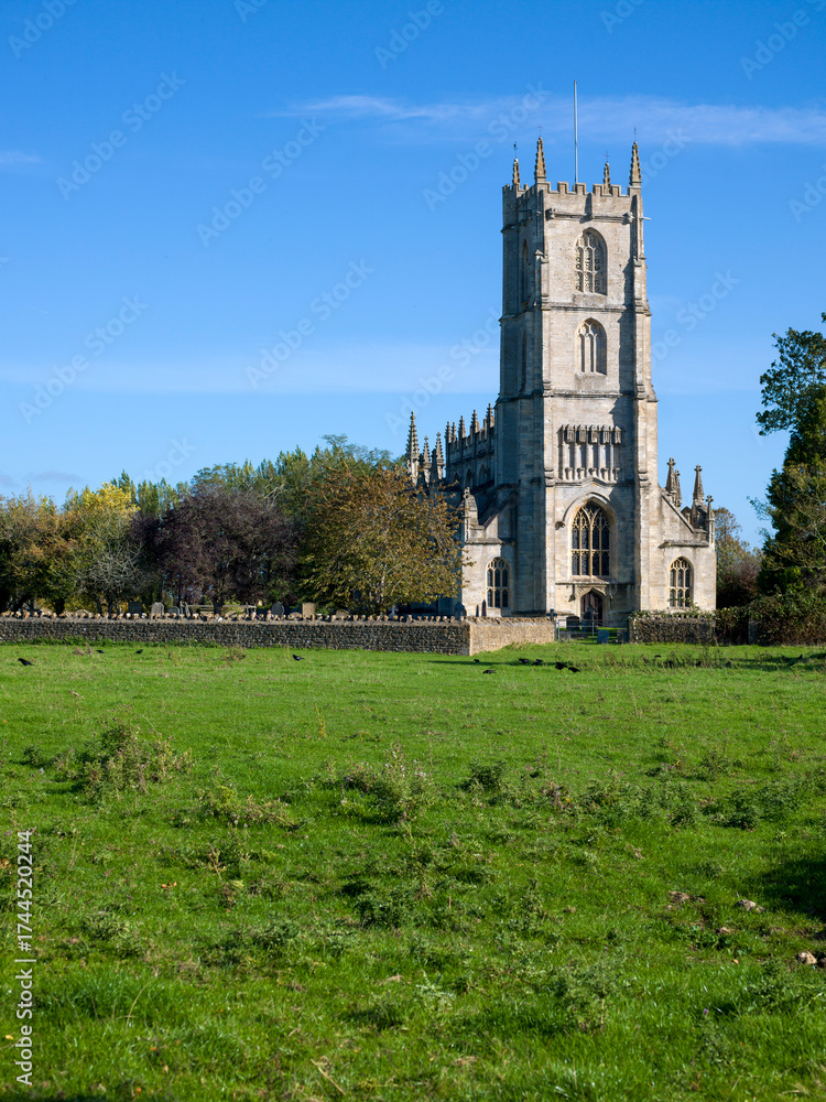 Naklejka premium Saint Mary's Church Steeple Ashton. Pretty country church surrounded by fields